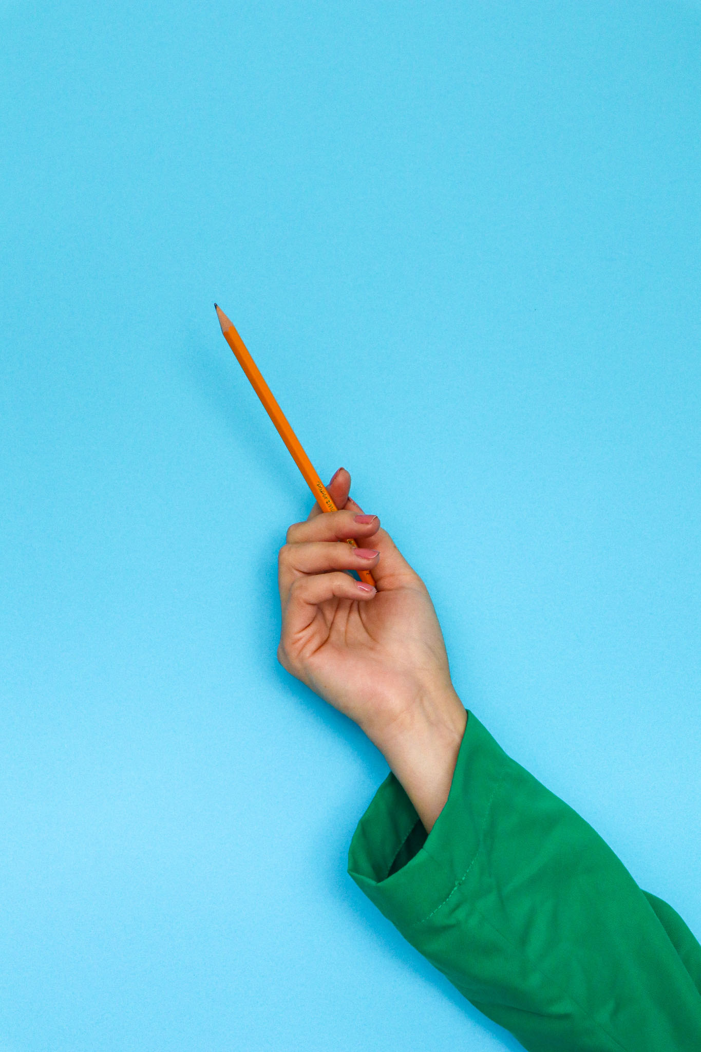 Creative hands holding pencil